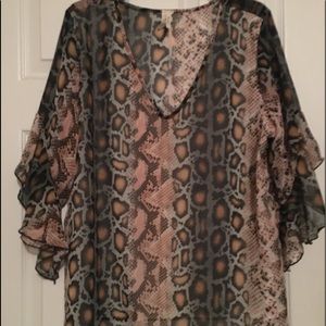 Snake skin shirt. New w/o tags. Size large.